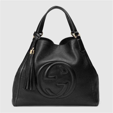 gucci darker clothes|Gucci black leather bag.